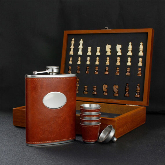 chess wood box with glasses and flask